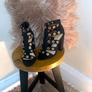 Gold and black open toe heels